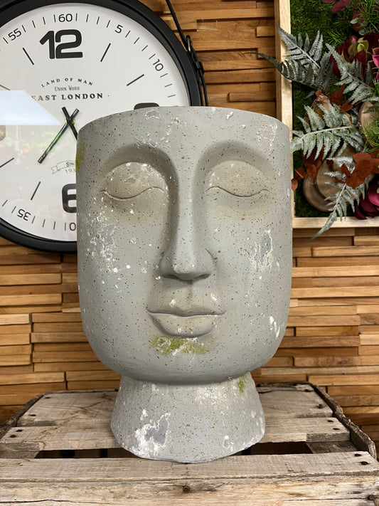 Statut visage effet pierre